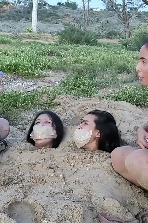 Buried by the Beach Bitches!