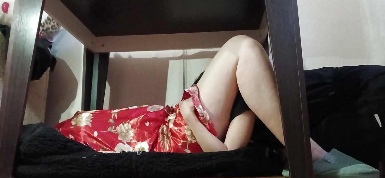 I’m under the table, licking my Japanese neighbor’s pussy