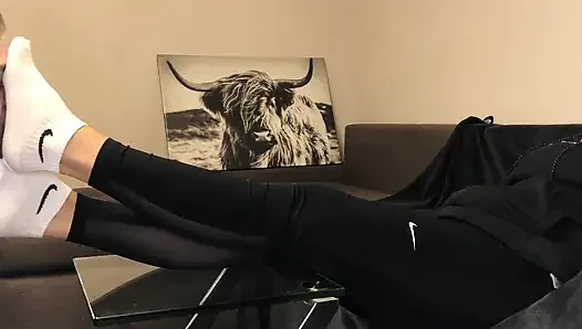 Dirty White Sneaker Worship - Smelly Socks in Face with Valeria Night (side View)