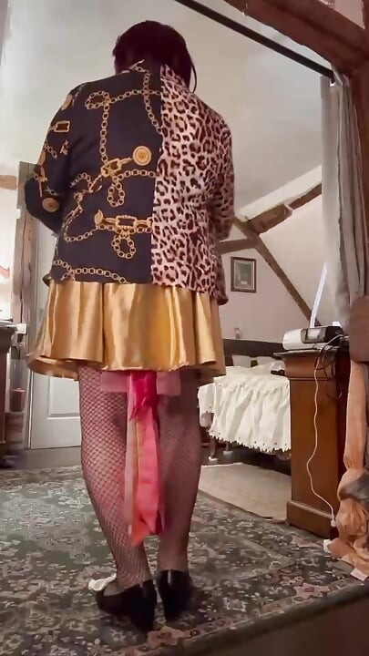 Dressed in a little gold skirt for an evening out