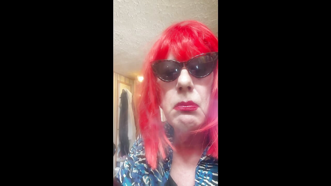 MRS. ROMAN DESTROYING A MARLBORO 100 MENTHOL CLOSE UP - WITH DANGLING AND NOSTRIL EXHALES