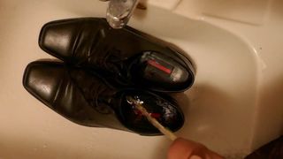 Piss in men's dress shoe