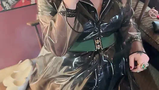 PVC Clad In Her See Through Coat Miss Tina Snua Smokes A Cigarette For You