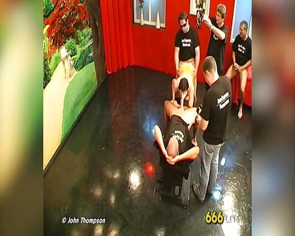 Brunette Slut Drenched in Piss by Multiple Men