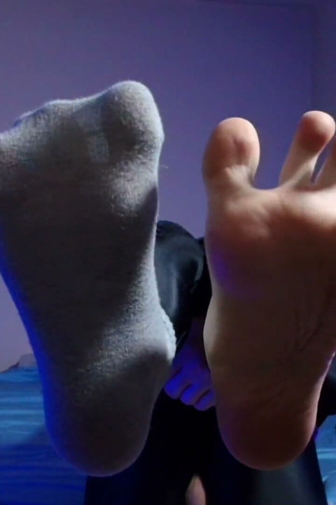 Puppy Keeps Teasing You with His Socks and Bare Paws