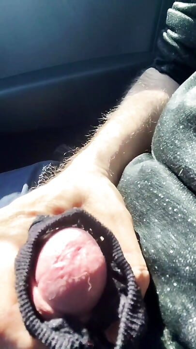 Almost caught! He jerks off in traffic in front of me, I love watching. Big cumshot! Part 1