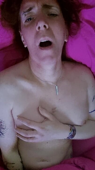 Trans playing in bed solo