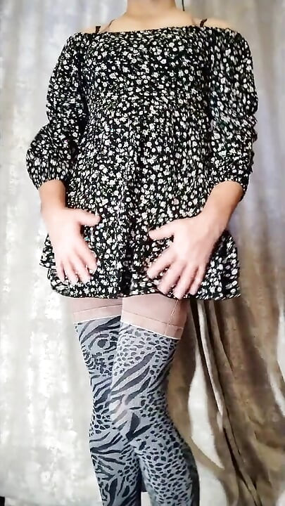 Sissy poses in fitness clothes, tights, and a short dress