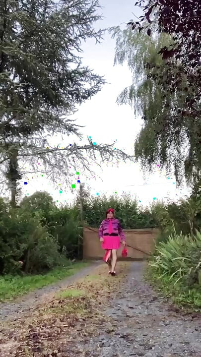 Dressed with a new pink skirt and the fuchsia tie stained with semen for a night out