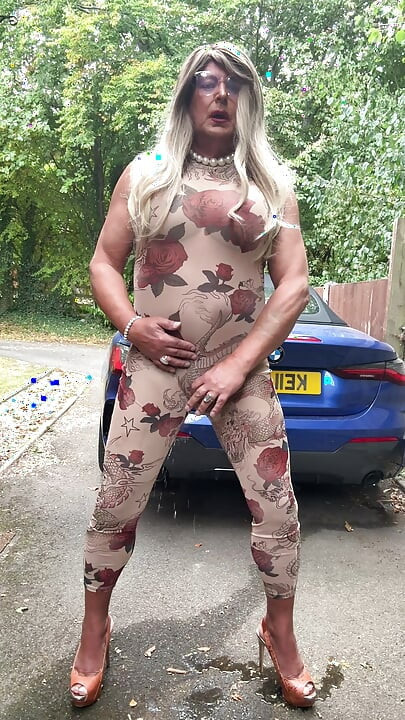 Sexy Crossdresser kellycd2022 in sexy floral see thru catsuit and heels