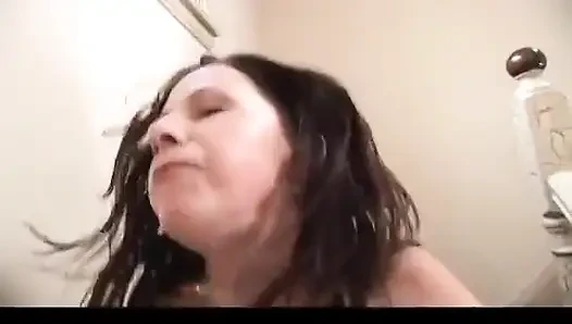 Busty slut deep throats dude's dick on a staircase before fucking