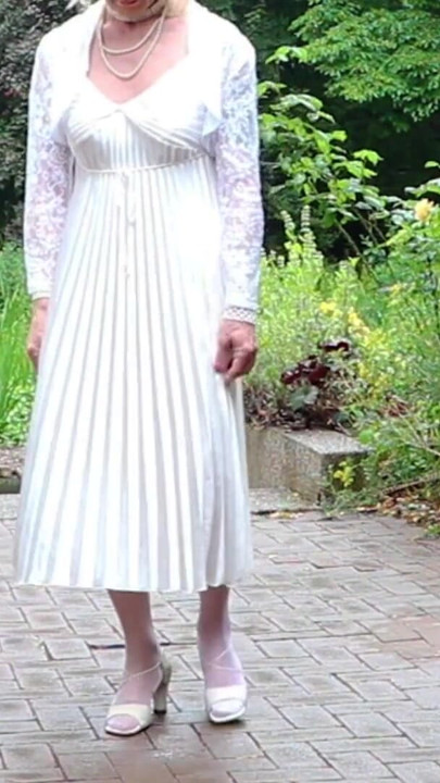 Epic moment from "Severe Caned In A Pleated Satin Gown"