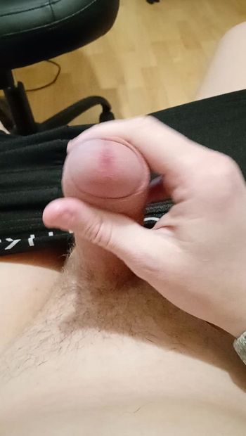 Guy jerking off uncircumcised cock on the table  #10