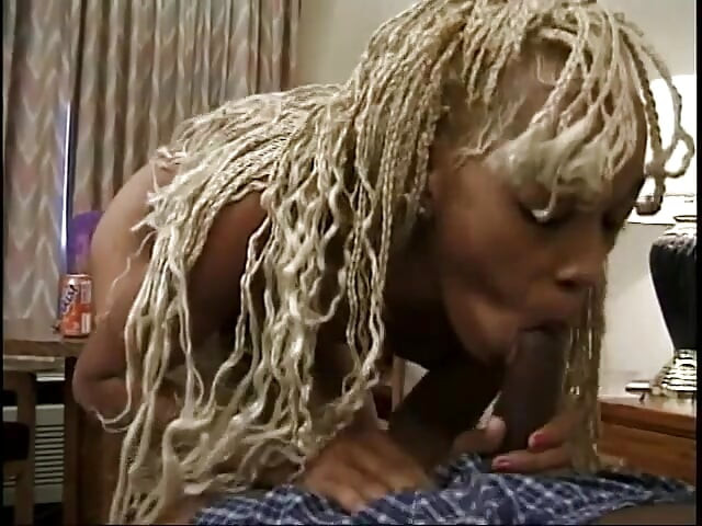 Luxurious blonde takes long black dick inside lying on belly