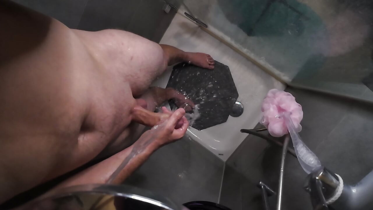 Soaping up my little dick until it gets massive. Wet edging fun in the shower.