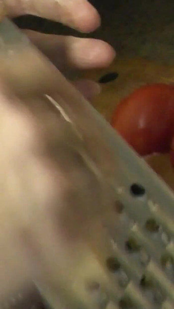 Powerful moment from "Sexy MILF continues cooking in kitchen naked without panties and bra in red transparent negligee. Big"
