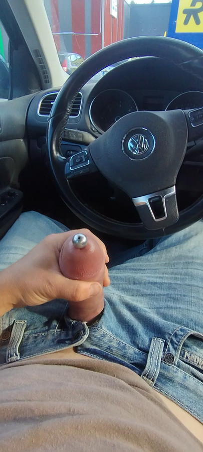 Wanking pumped cock with penis plug  in public parking