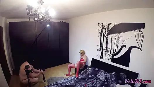 Behind the scene pissing in a glass