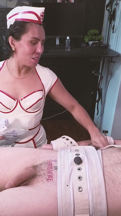 Latex Nurse Dominafire Sounds & Milks Bound Slave in Segufix