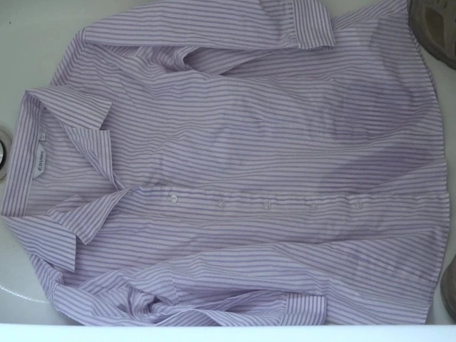 pissing on purple striped school blouse