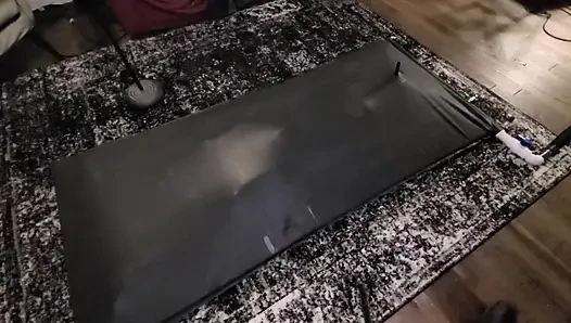 Cute twink tormented in latex vacbed
