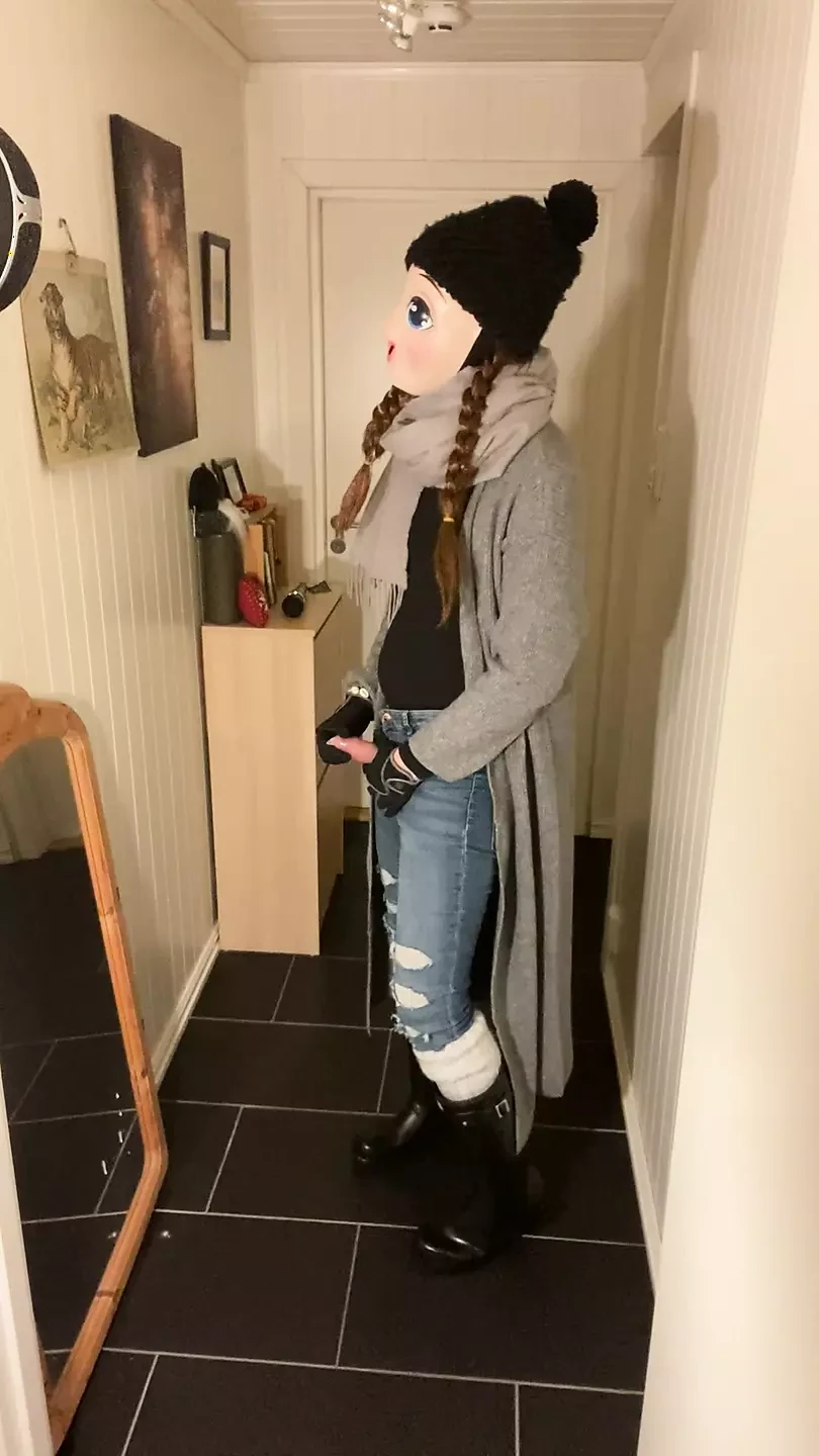 Femboy in tight jeans and hunter boots