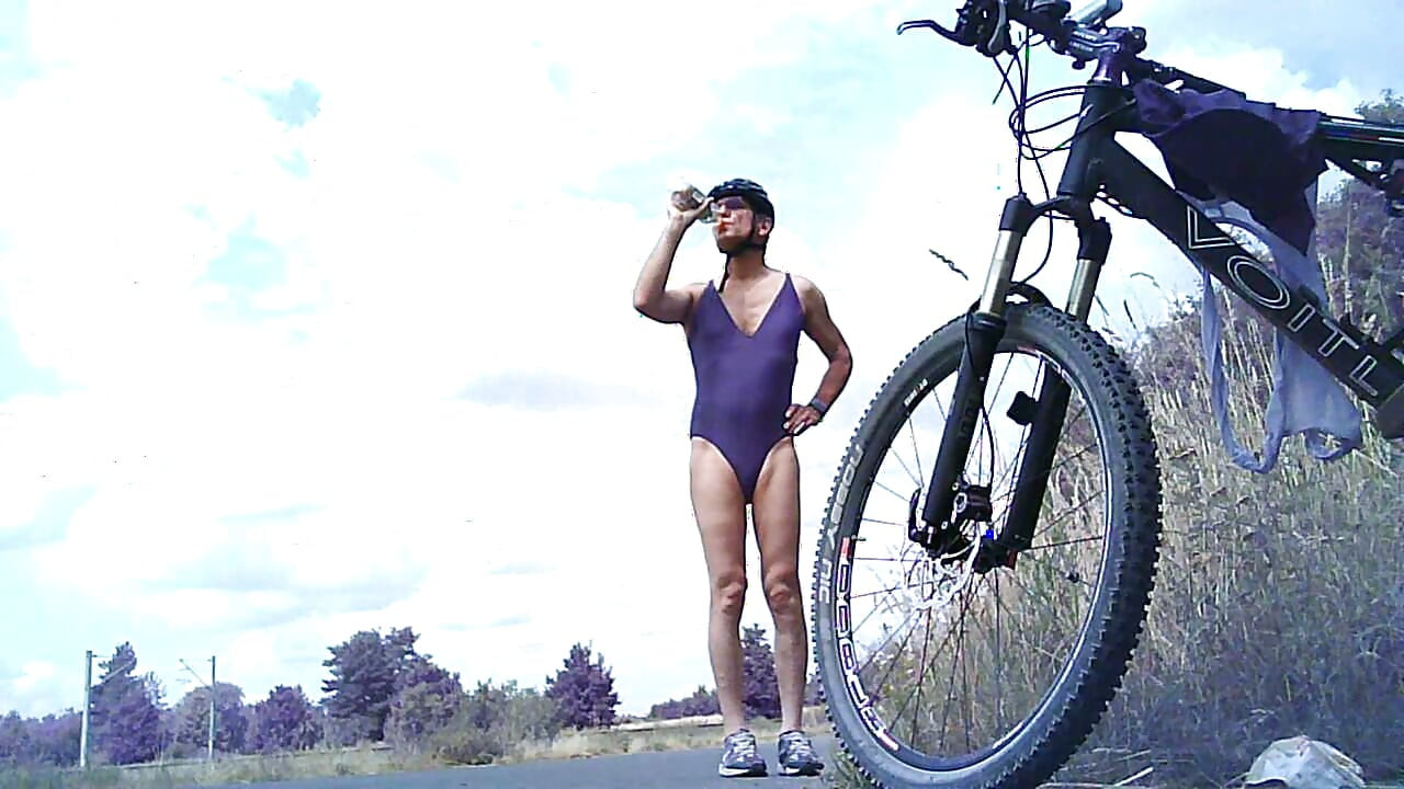 In a swimsuit on the bike