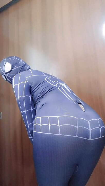 Spider-Man strips naked and shows his ass.