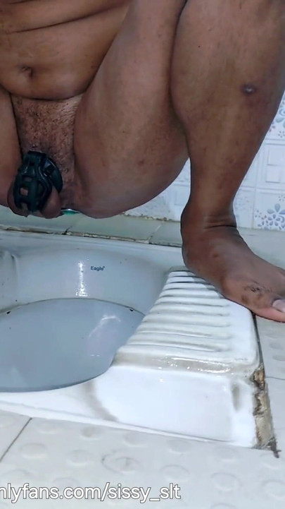Emotional moment from "Ladyboy in heels going outdoor and piss while walking in her favorite chastity cage"