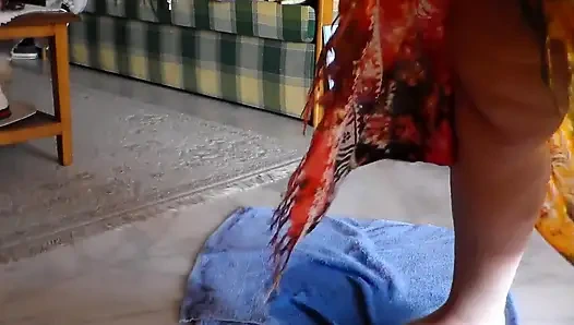 Jen is peeing on a towel in the livingroom