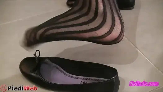 Nyllady Footplaying with a Phone Card in Patent Black Stockings