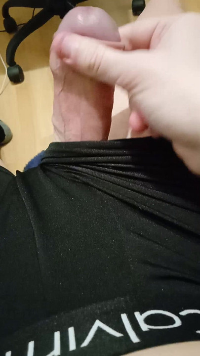 Hot young guy watches hentai masturbate big cock and moan from...