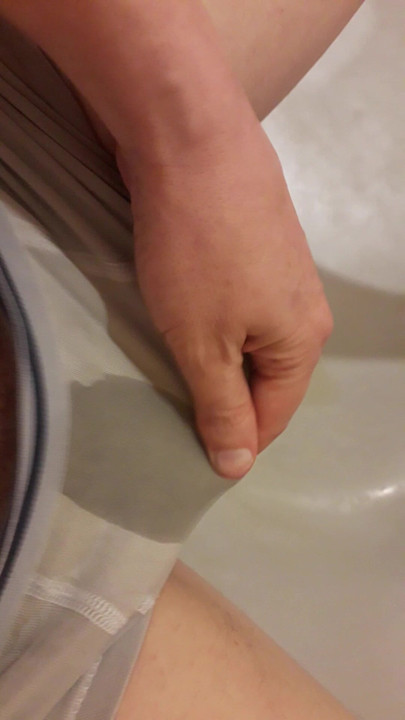 I stroke my cock through my wet briefs