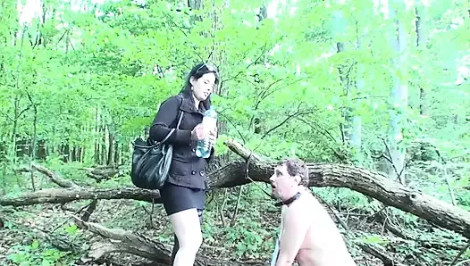 Goddess Gloria humiliating her slave in the woods