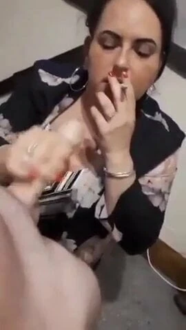 Get a blowjob as she smoke