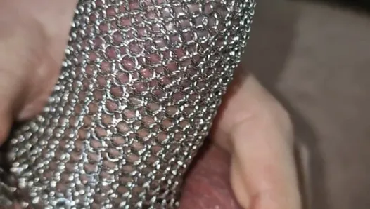 Penis chastity cage with chainmail. Can I jerkoff and cum?