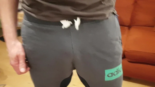 Guy fondles his beautiful overhung foreskinned willy
