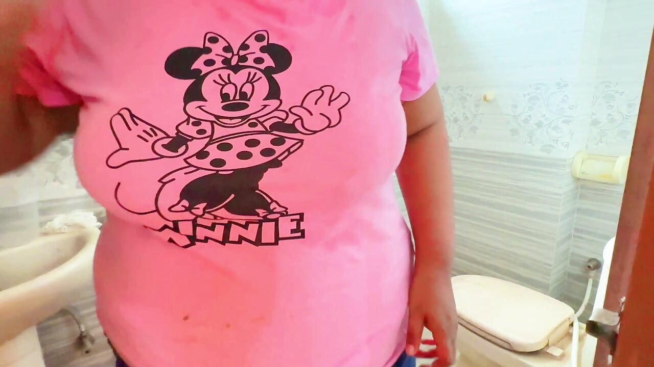 Indian Desi Mother-in-law While Peeing in the Bathroom