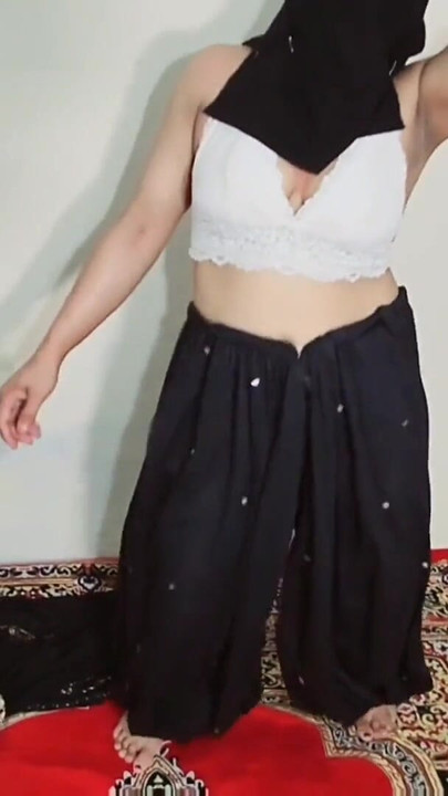 Emotional moment from "Arabic sexy hot girl wearing black hijab in house doing sensual dance, Desi Indian slut Amrozia"