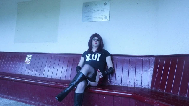 Crossdressed in a public railway waiting room