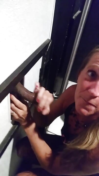 Hot MILF gives glory hole blow job while hubby jacks off