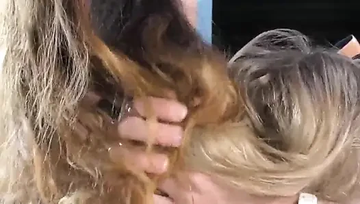 A hairjob with blonde and brunette babes