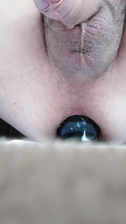 Riding butt plug and jerking off