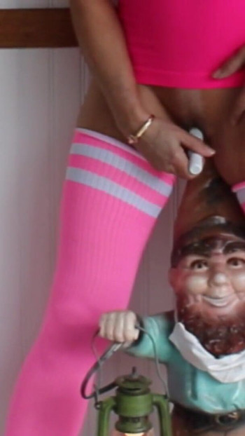 Captivating moment from "Amazing Solo by Sexy MILF Candi Annie with Garden Gnome!"