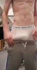 Teasing Twink wanks in his shorts