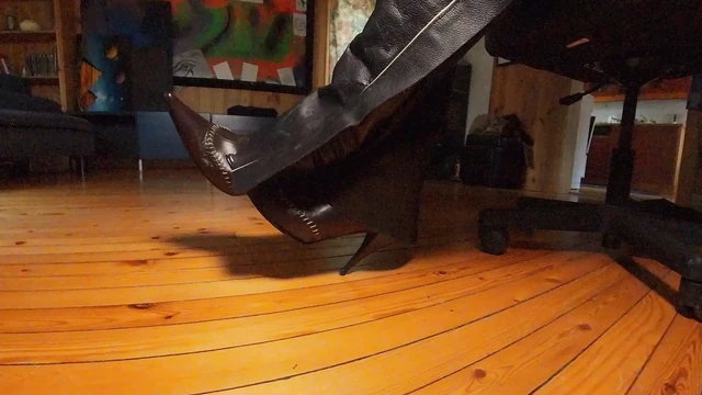 Leather chaps and pointy boots