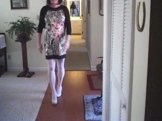 Floral dressSissy shows her plug!