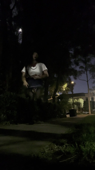 Asian sissy in school girl uniform night walk in park with vibrator