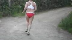 Granny jogs topless