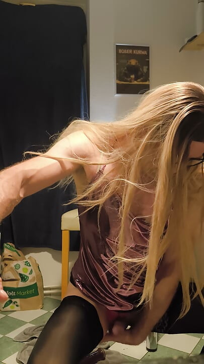 Sissy N. from Berlin masturbates again in the kitchen fucking huge dildo